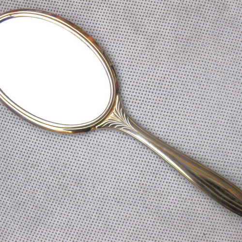 Hand mirror used, enamel and bijouterie