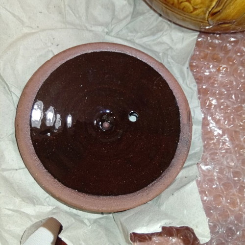 Traditional ceramic clay pot with lid and side handles