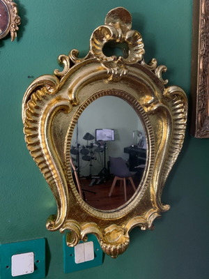 Vintage wall mirror used with plaster and gold leaf