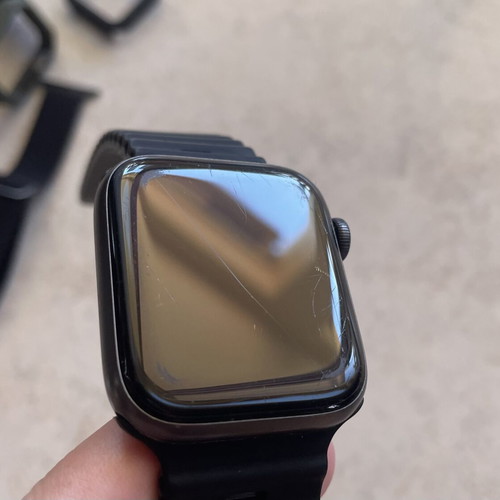 Apple Watch Series 5 44mm with charging cable, straps and screen protectors