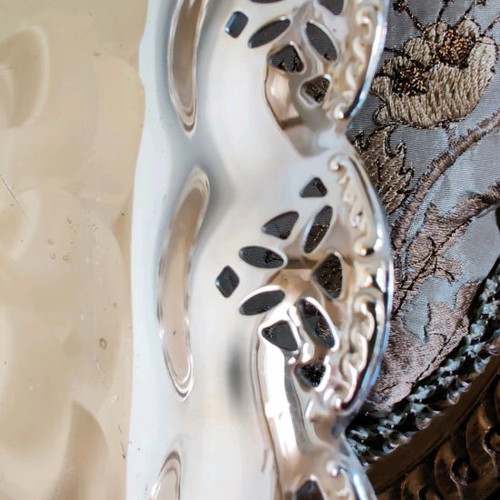 Metal serving platter used with beautiful decoration for desserts