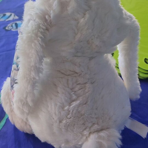Stuffed bunny used with flower
