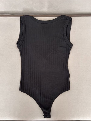 Pink Woman black ribbed body with V neckline size S like new