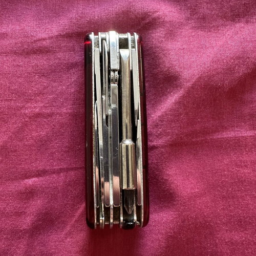 Victorinox SwissTool multitool used, authentic Swiss pocket knife