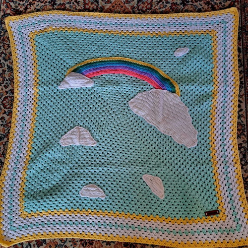 Baby knitted blanket handmade with rainbow design