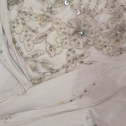 Wedding dress new, designer piece from London in ice color with embroidery