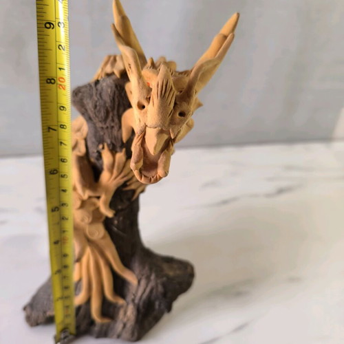 Wooden handmade dragon used with wooden base