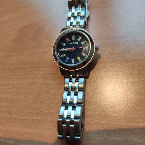 Nautica women's quartz watch with blue dial and stainless steel bracelet used