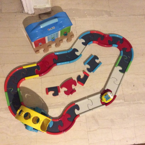 Toy racetrack used, over 30 pieces, safe for children