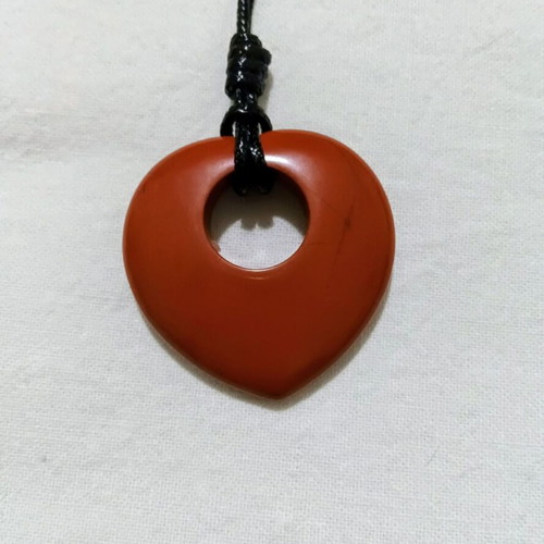 Semiprecious stone pendant with red jasper heart donut shape