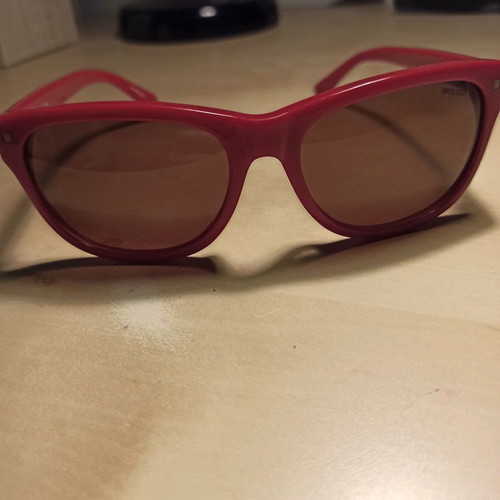 Brixton women's red sunglasses used with 100% UV protection