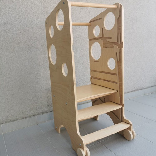 Montessori learning tower with accessories and instruction book
