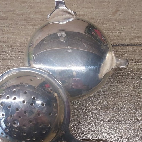 Vintage tea strainer like new, silver with drip tray
