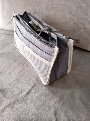 Bag organizer in neutral gray like new