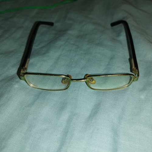 Children's prescription glasses used, black and green