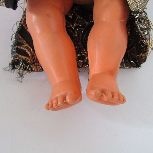 Vintage souvenir doll with traditional oriental costume used