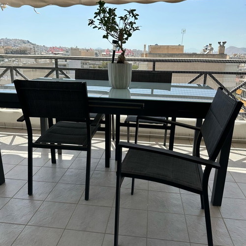 Balcony dining set like new with 4 aluminum chairs