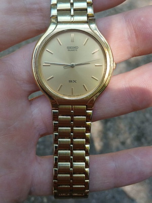 Seiko Quartz SX V701-6K00 wristwatch like new, missing strap clasp