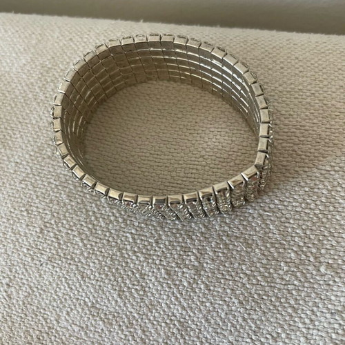 Bracelet with Crystals like new, silver color, elastic and sparkling