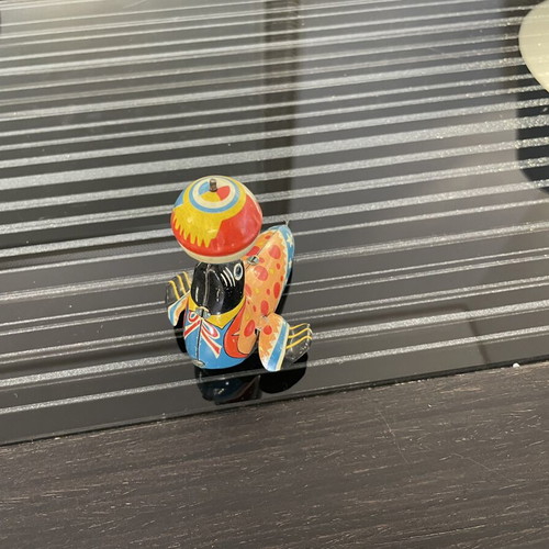 Seal with spinning ball vintage tin toy used