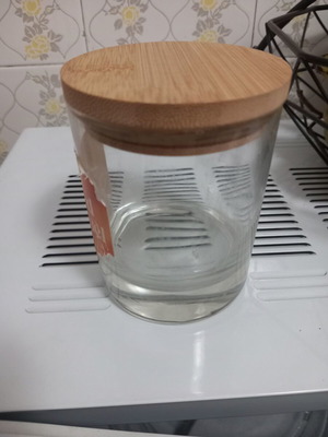 Candle container with wooden lid