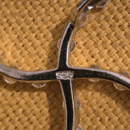 Silver cross with stones like new