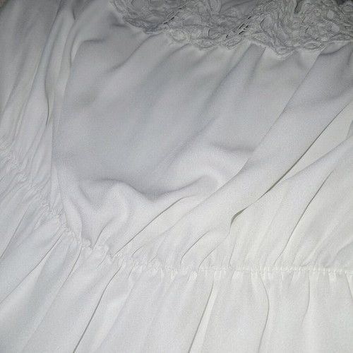 White women's blouse with ruffles elastic new