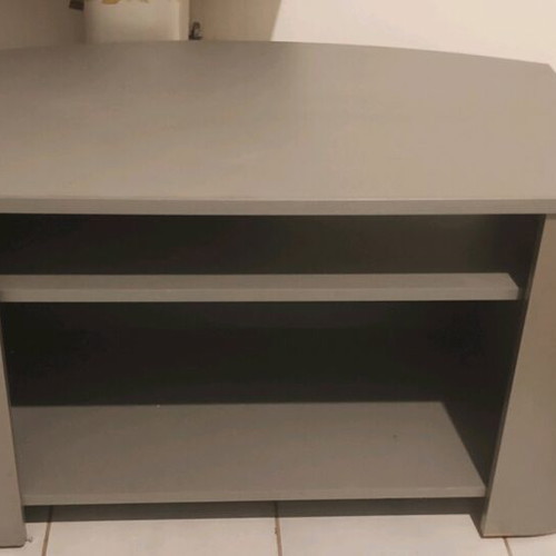 TV stand used, silver color with storage shelf