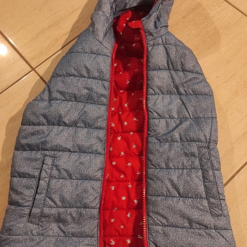 Sleeveless jacket 6 years like new, double-faced, blue and red