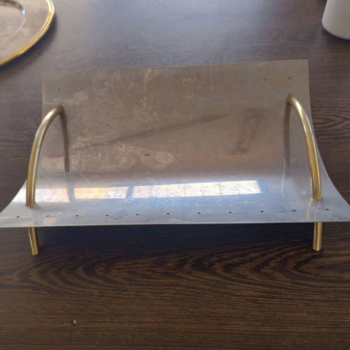 Metal decorative tray used with gold details