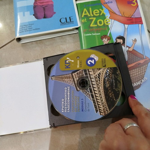 Old cassettes and CDs from French language books