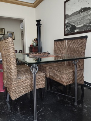Dining set with glass table and 4 woven chairs like new