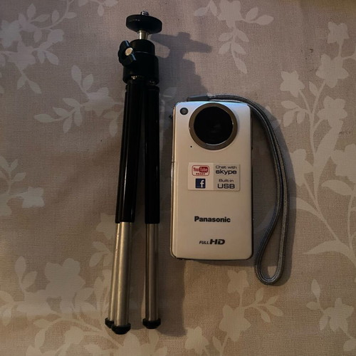 Panasonic HM-TA1 Full HD video camera used with mini tripod
