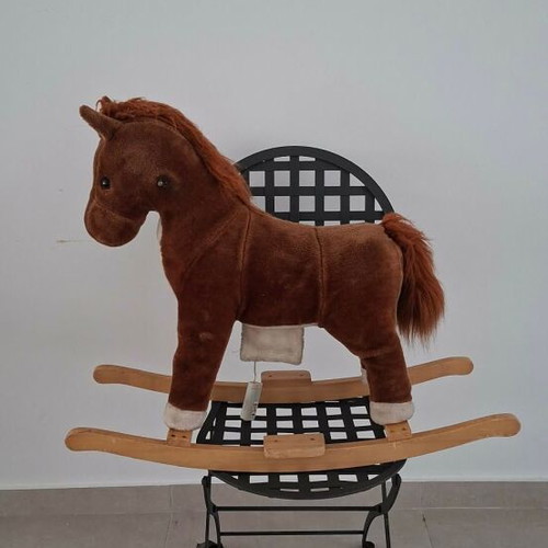 Plush rocking horse used with wooden base