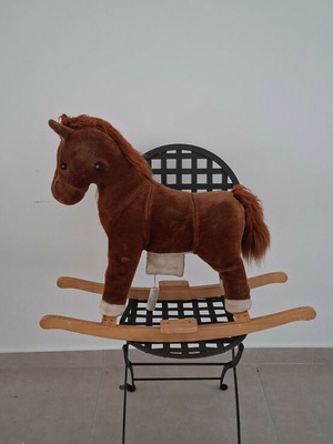 Plush rocking horse used with wooden base
