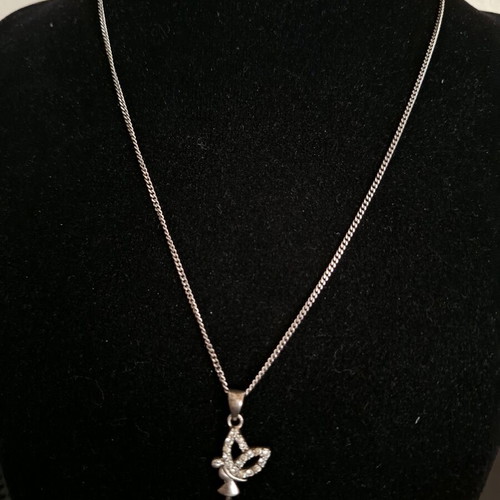 Silver 925 necklace like new with fairy pendant and clear stones