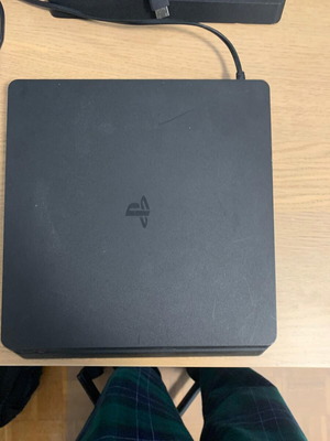 PlayStation 4 Slim like new with 2 controllers