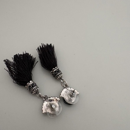 Black dangle earrings used