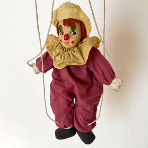 Vintage clown marionette with porcelain head and wooden control cross, like new
