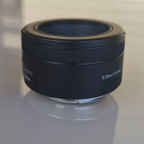 Canon EF 50mm f/1.8 STM lens with hood