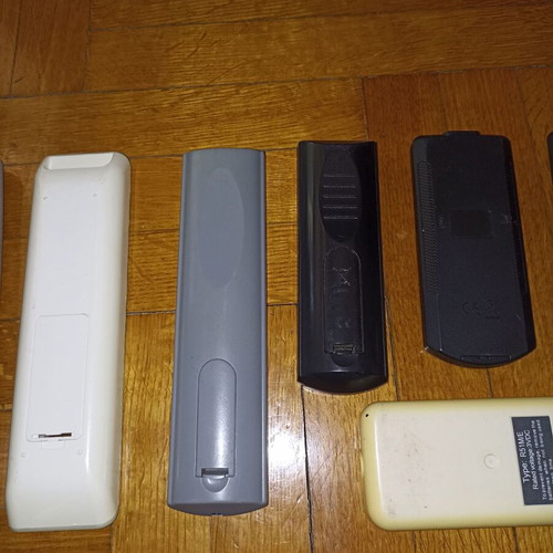 Set of 7 different TV remote controls