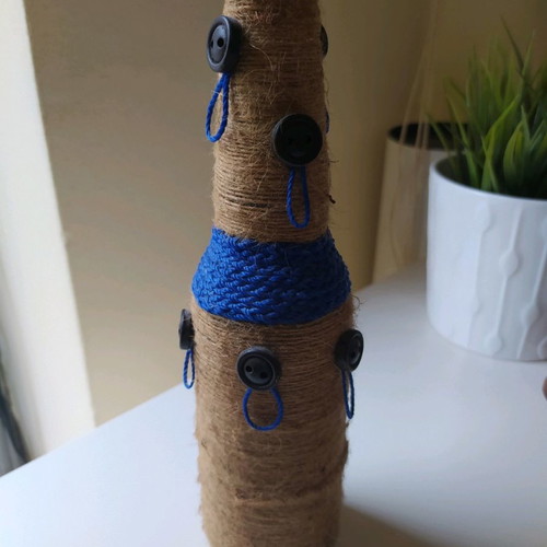 Decorative bottle for earrings new, handmade with 9 loops