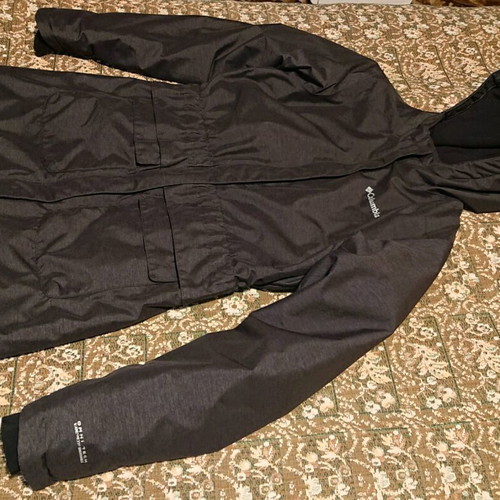 Columbia jacket like new with fleece hood and waterproof protection