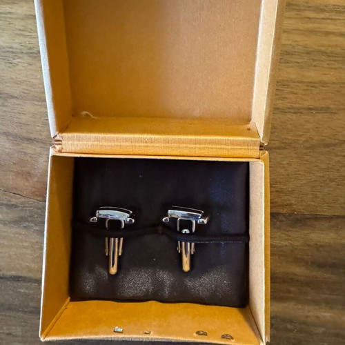Tods cufflinks like new, silver color