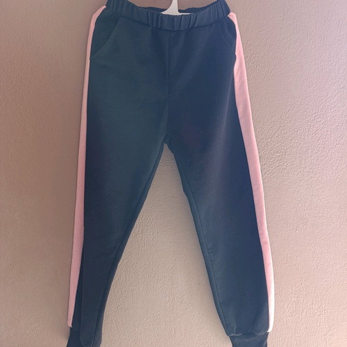 Sportswear like new, black with pink stripe, size 128 cm