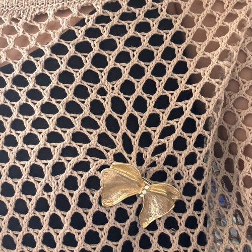 Gold-tone bow brooch, vintage style