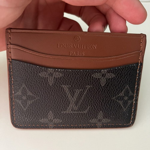 Louis Vuitton leather card holder used, black and brown