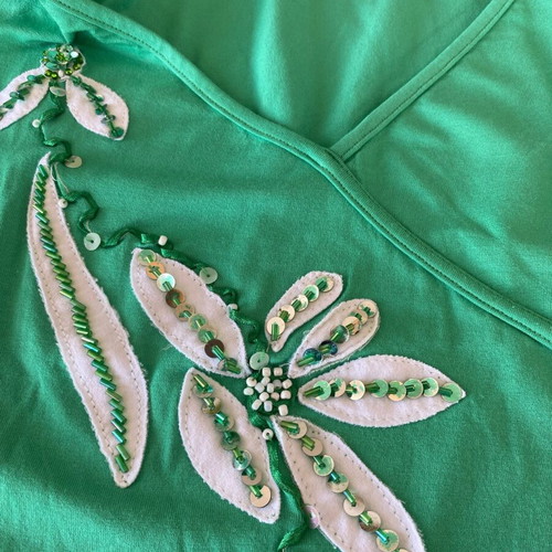 Green blouse S/M made of viscose with designs and sequins like new