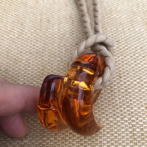 Baccarat crystal pendant like new, amber color