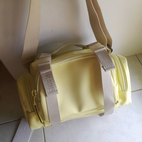 Rains shoulder bag, beige and yellow, waterproof fabric